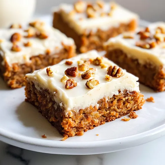 A plate of cake with nuts on top.